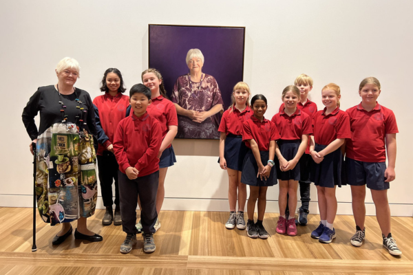 Stephanie and Majura Primary students with her portrait