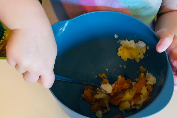 Child making gnocchi