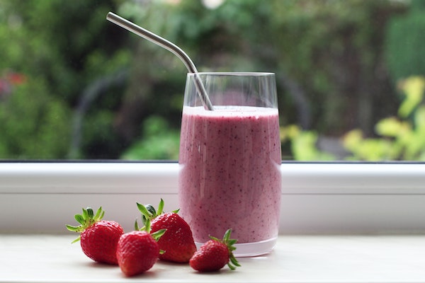 Berry smoothie on window sill